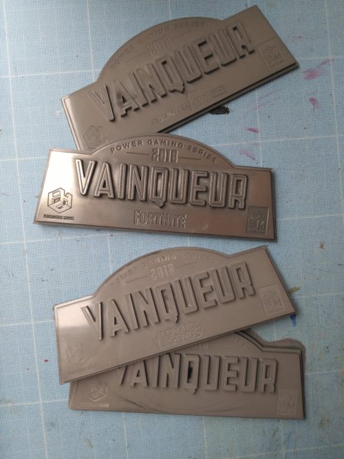 The metal coated plates of the four PGS trophies